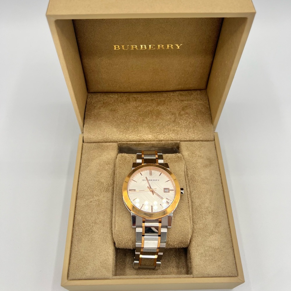 Authentic Burberry Watch (woman) new batteries required. In excellent condition
